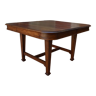 Extendable Art Nouveau table in carved walnut, circa 1900