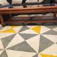 Table basse en merisier plateau verre cannage