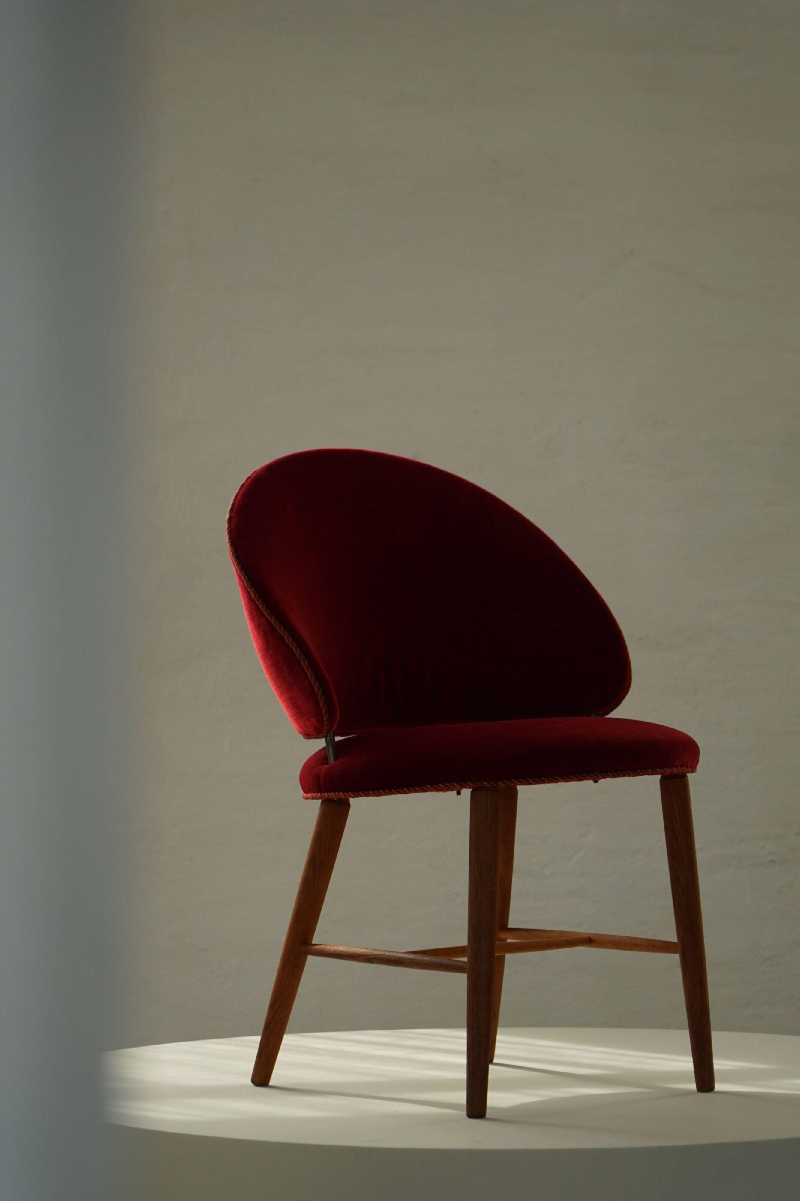 Mid-century toilet chair in oak and red velvet, by a Danish cabinetmaker, 1950s.
