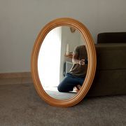 Vintage oval mirror in beech from the 70s/80s.