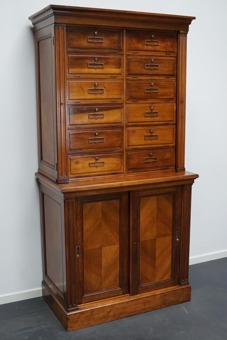 Walnut apothecary furniture France 1920s