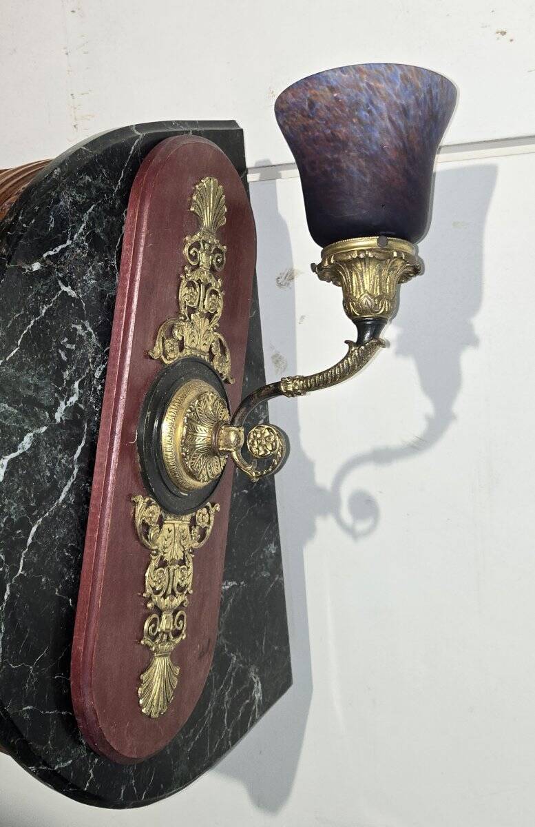 Large bronze and glass paste wall light.