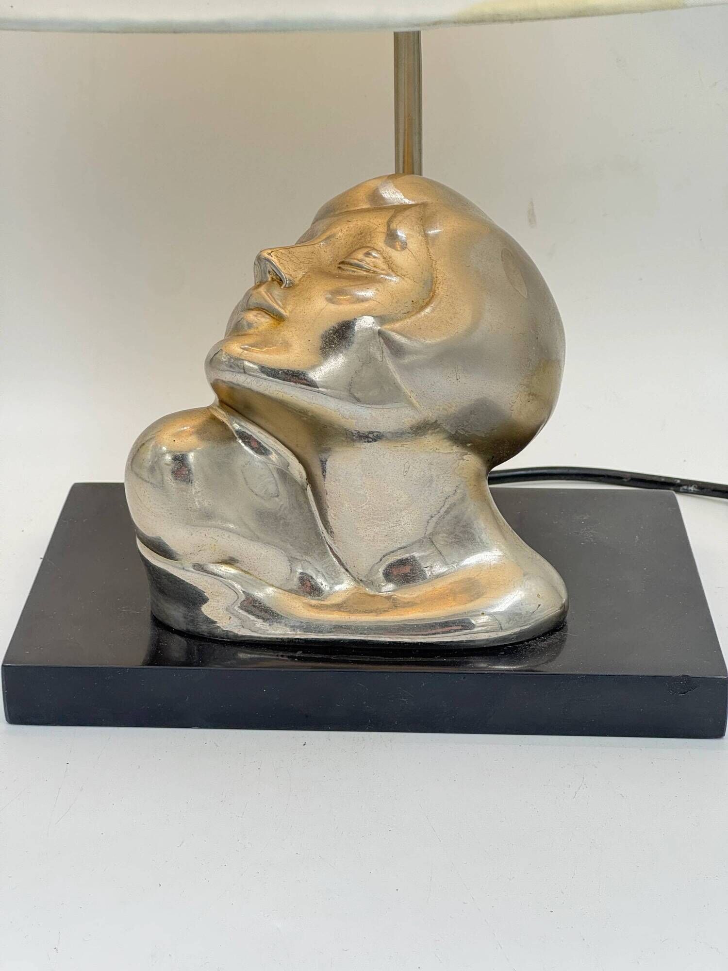 Vintage Art Deco style table lamp, face sculpture, silver-toned bust.