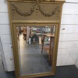 Gilded patinated trumeau mirror