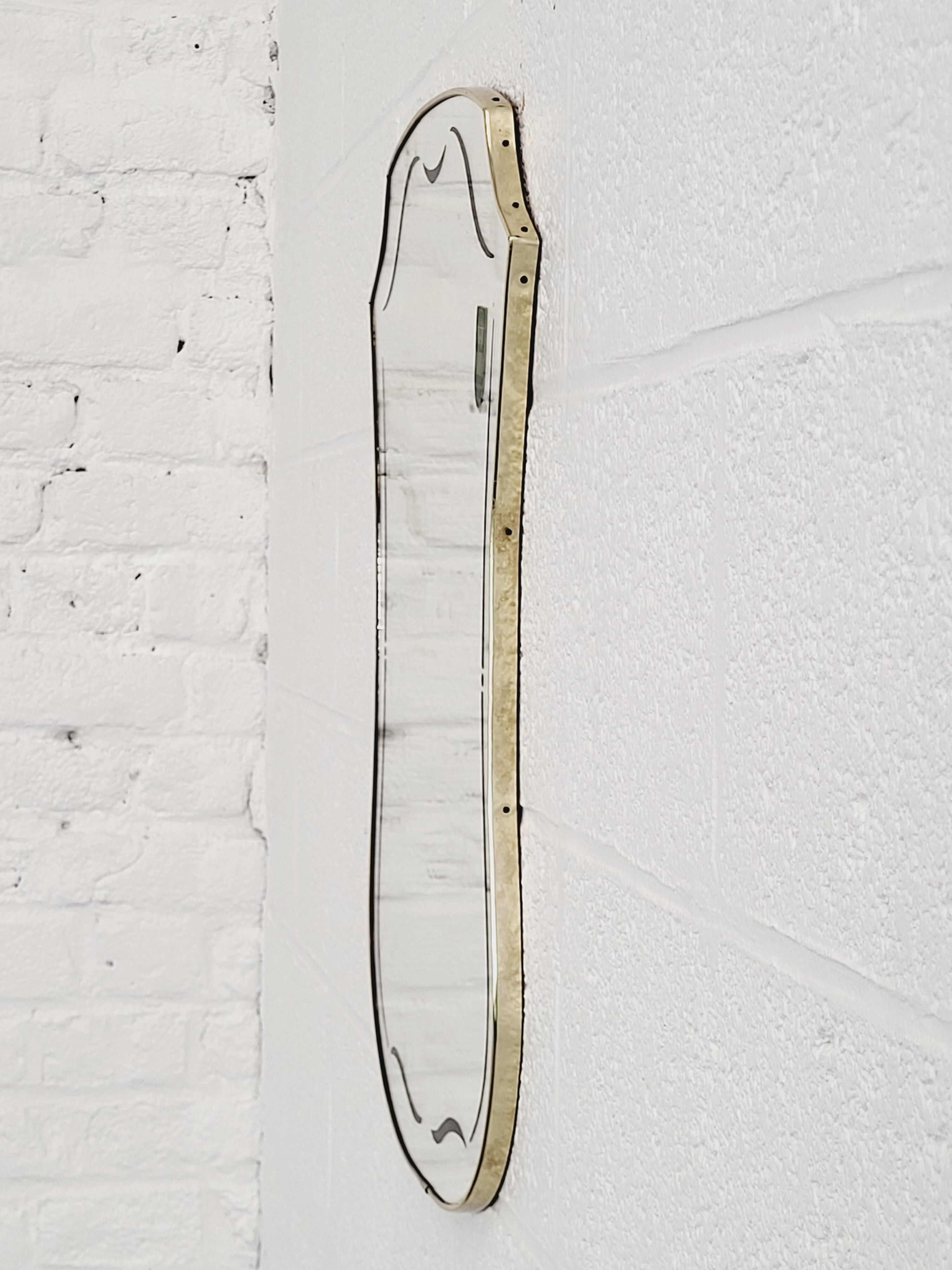 Rearview mirror and screen-printed free-form 60s on gilded frame