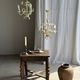 Small vintage cream metal flower chandelier with orange flowers and 3 arms.