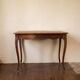 Selling an antique desk.