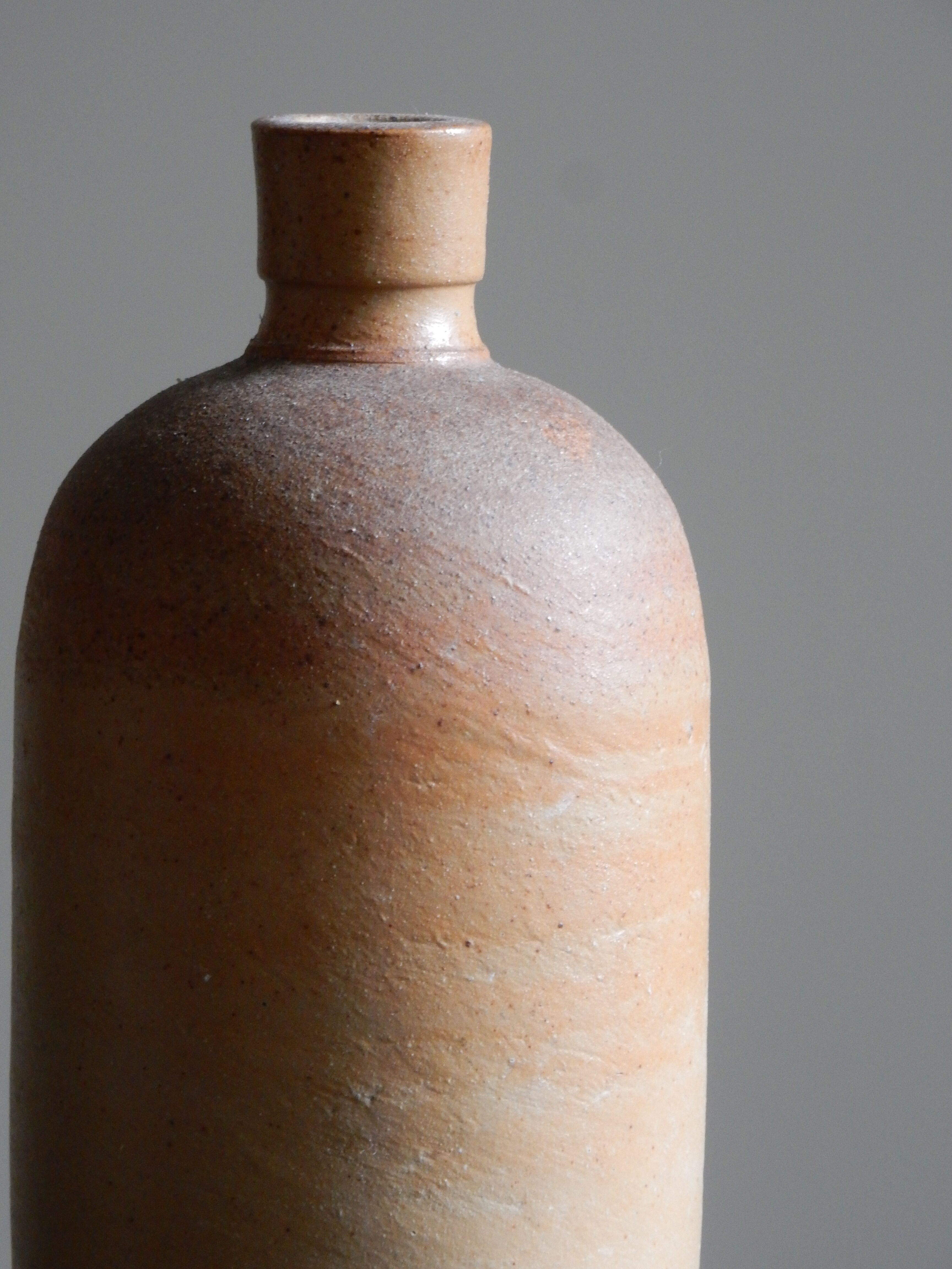 Old matte sandstone bottle