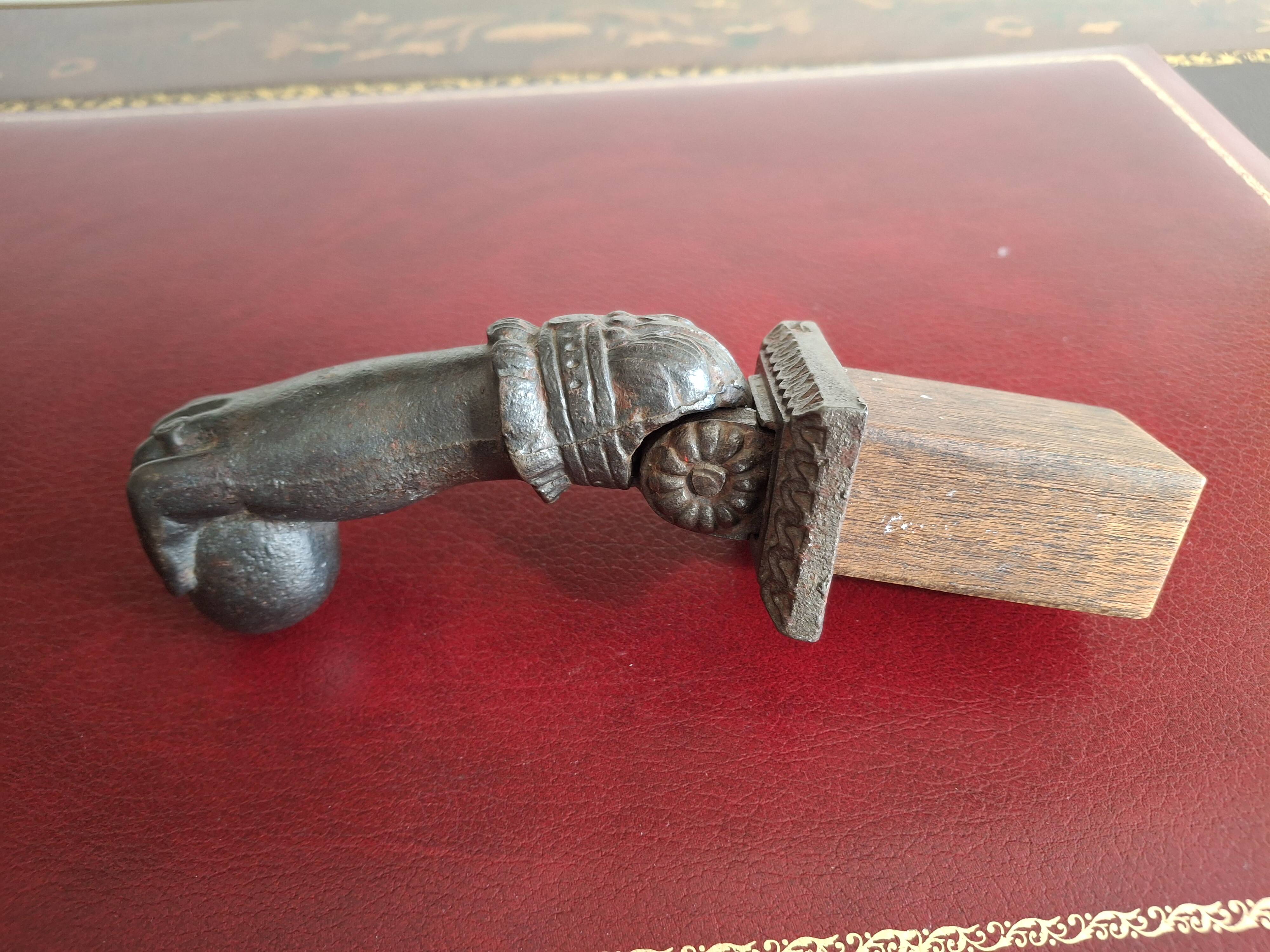 Cast iron door knocker from the 19th century or earlier.