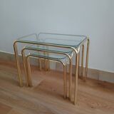 Glass and gold nesting table from the 70s
