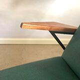 Lounge or easy chair with armrests