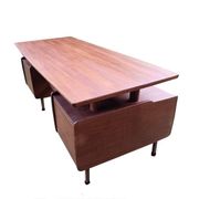 Vintage 1950s teak desk by designer Jacques Hauville.