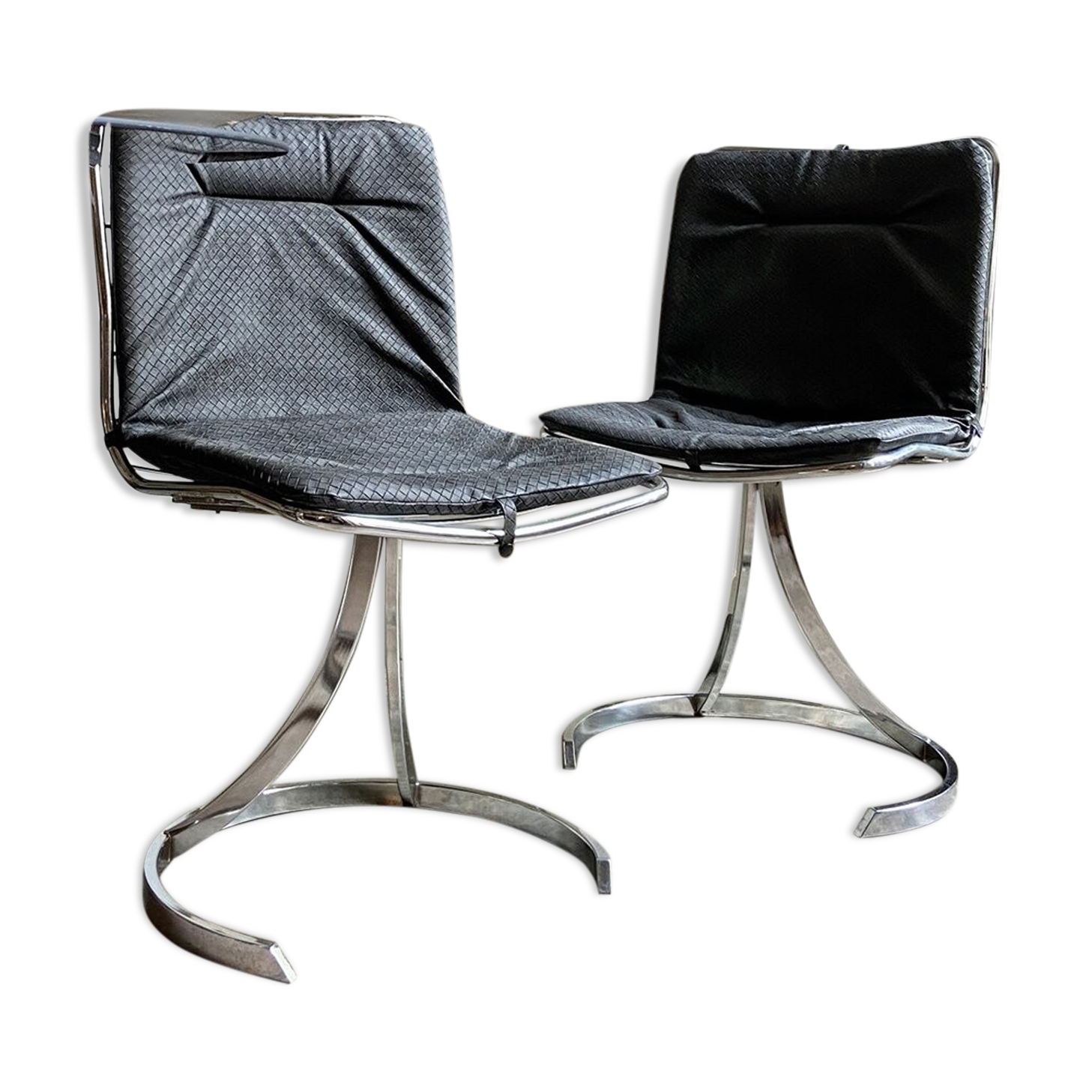 2 chairs in chromed metal and black woven skaï 1970s