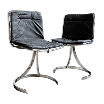 2 chairs in chromed metal and black woven skaï 1970s