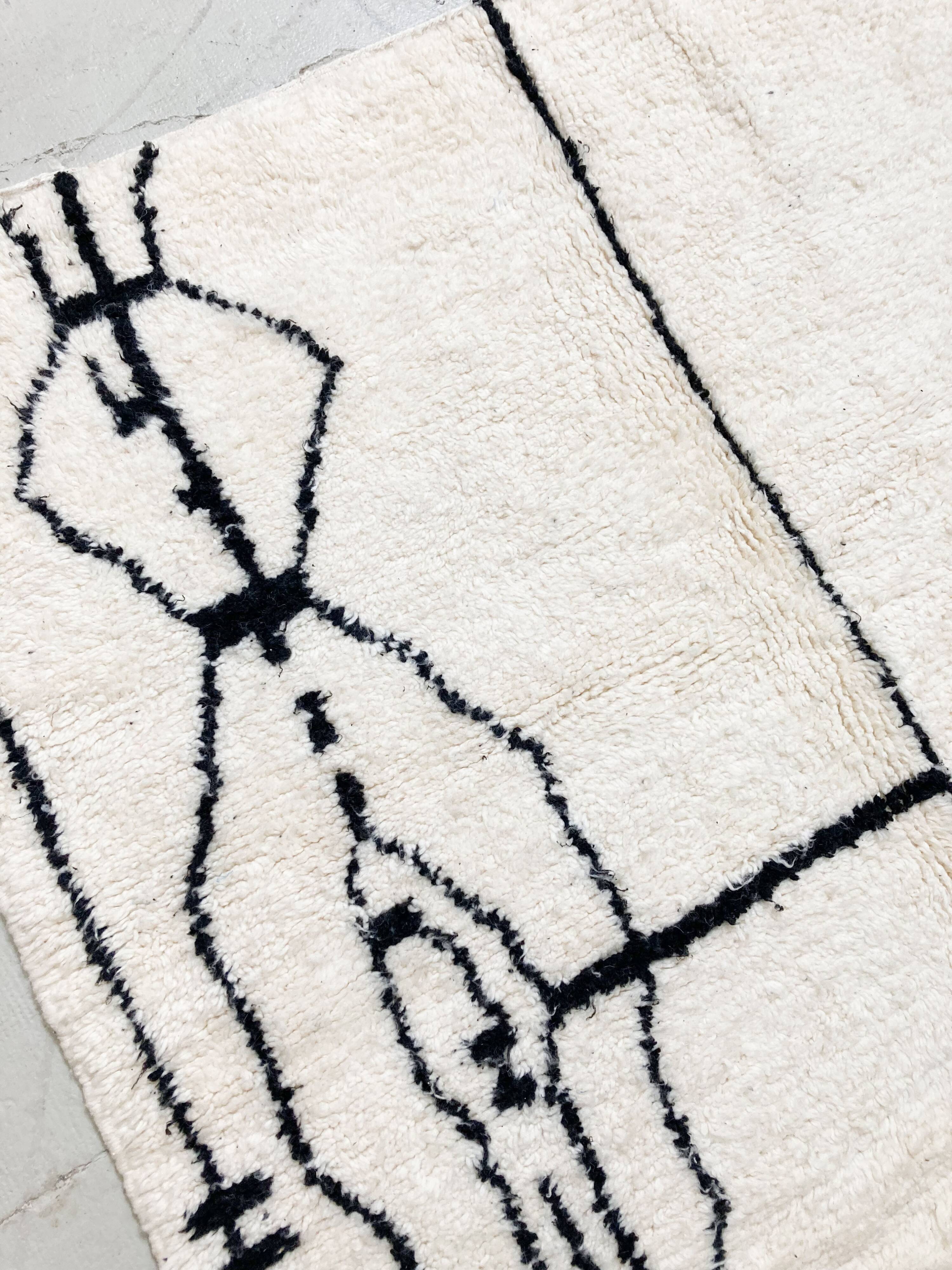 New Beni Ouarain Moroccan Berber rug with black graphic patterns