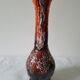 Vase en céramique orange marron avec coulures en relief
