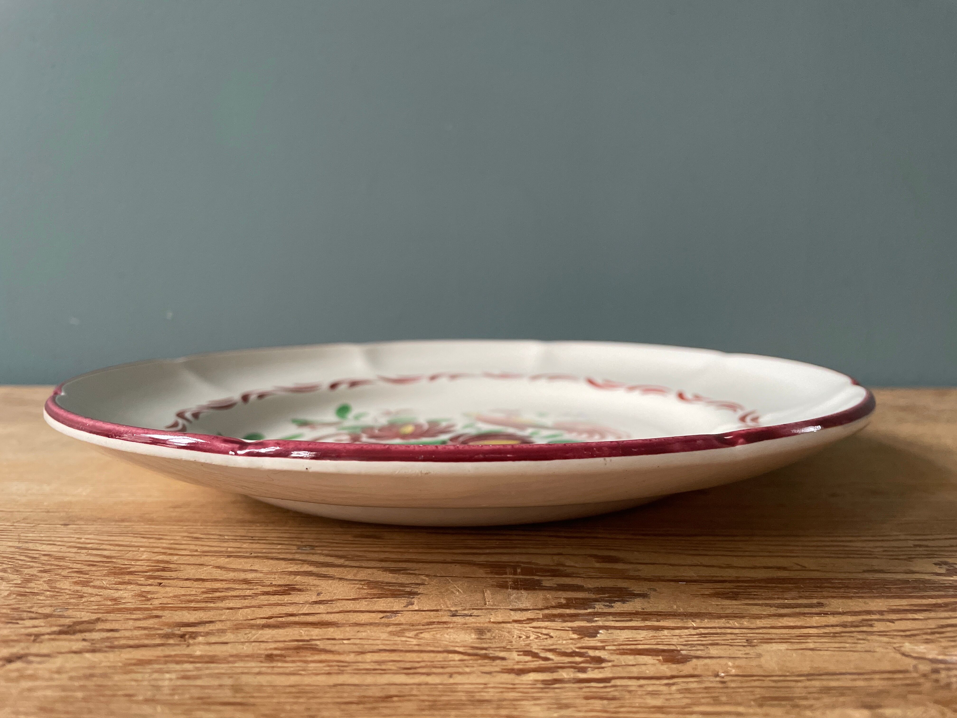 St Clement France plate, floral basket and rooster decoration