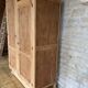 Asymmetrical Wardrobe in Raw Wood