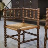 Pair of turned wooden corner chairs from the 1950s.