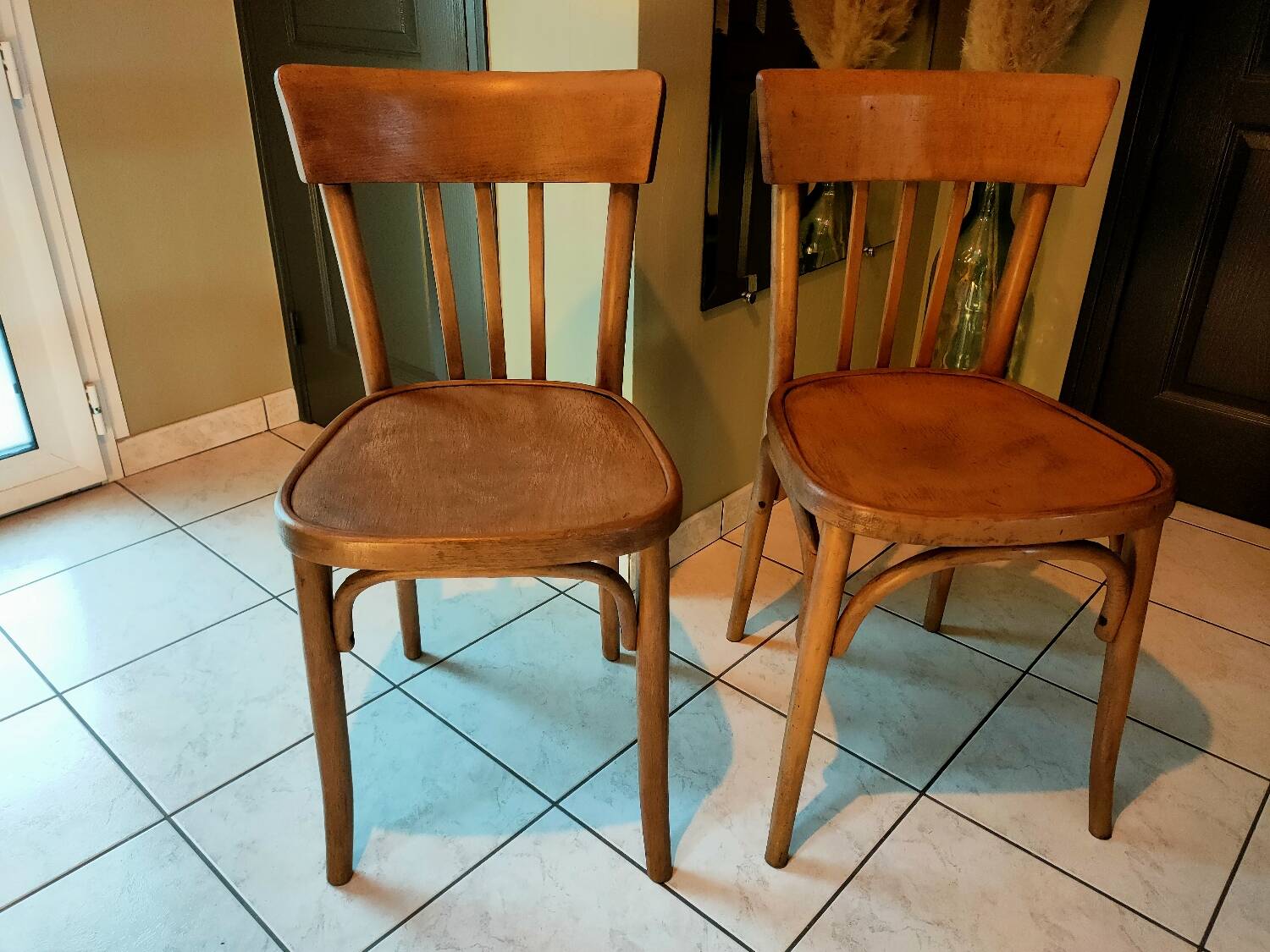 Pair of curved wooden bistro chairs