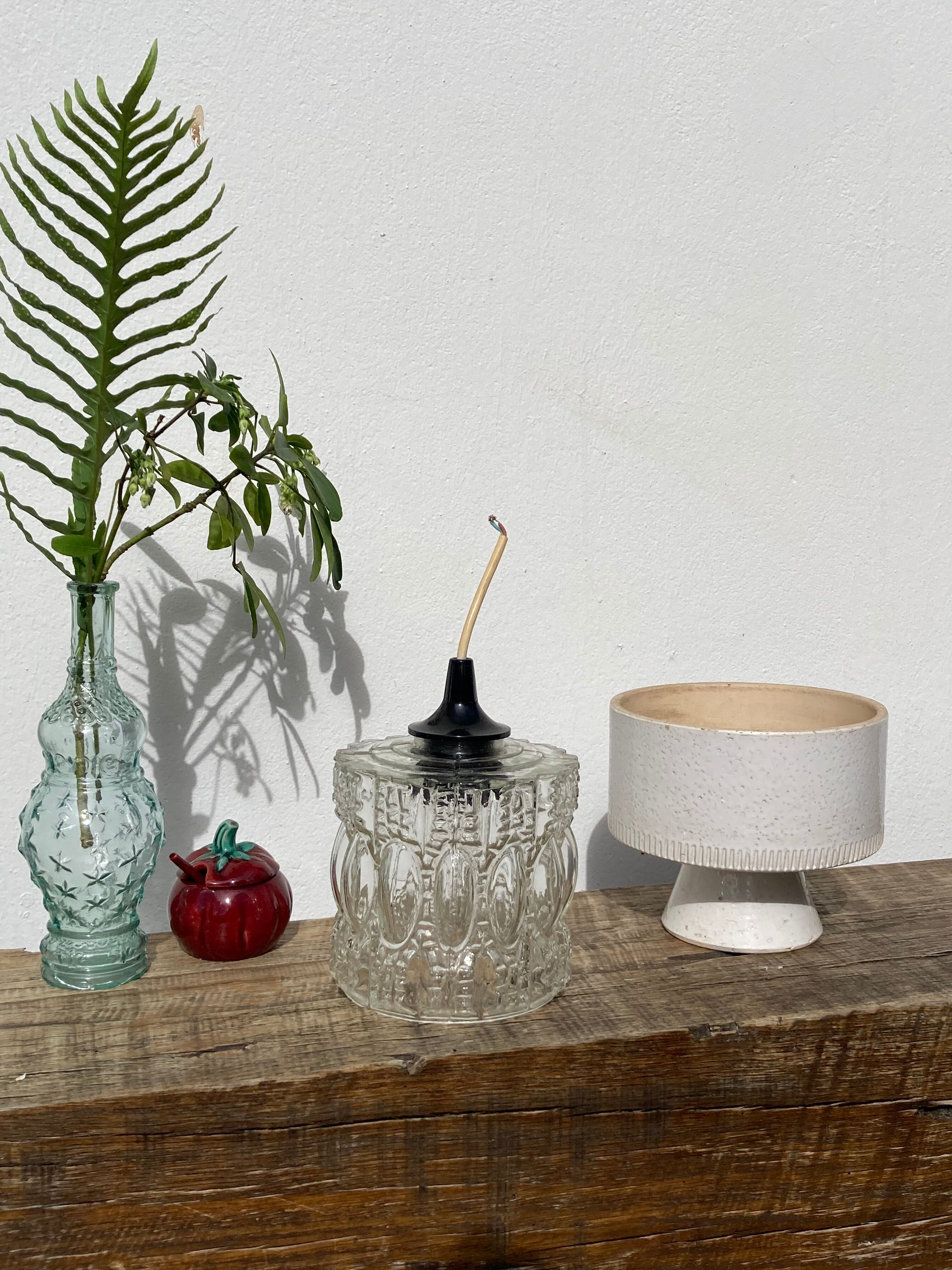 Suspension in molded glass 70s