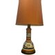 Vintage orange Portuguese table lamp with a ceramic base.