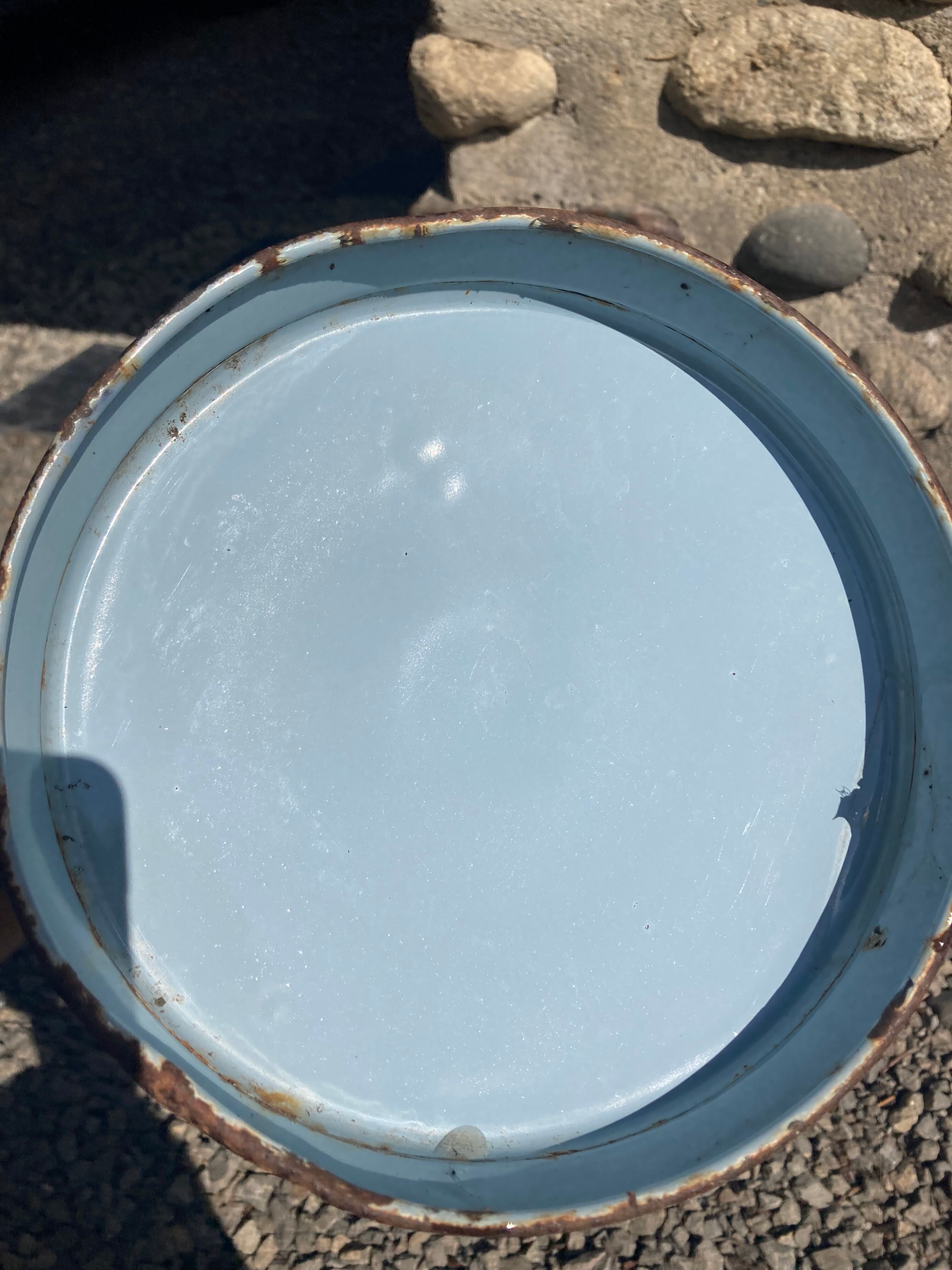 Broc in enamelled blue sheet metal