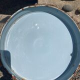 Broc in enamelled blue sheet metal