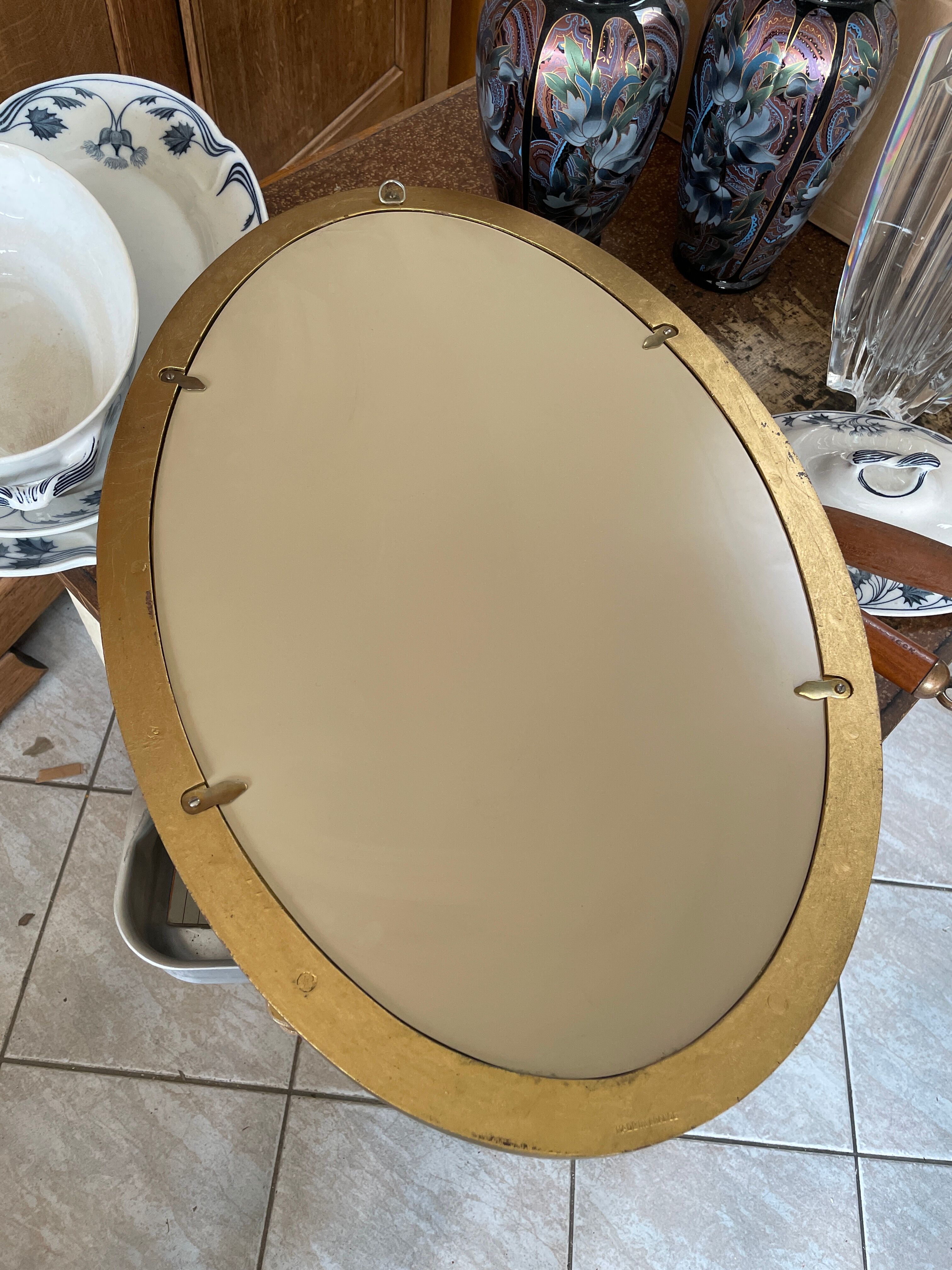 Miroir doré ovale