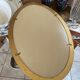 Miroir doré ovale