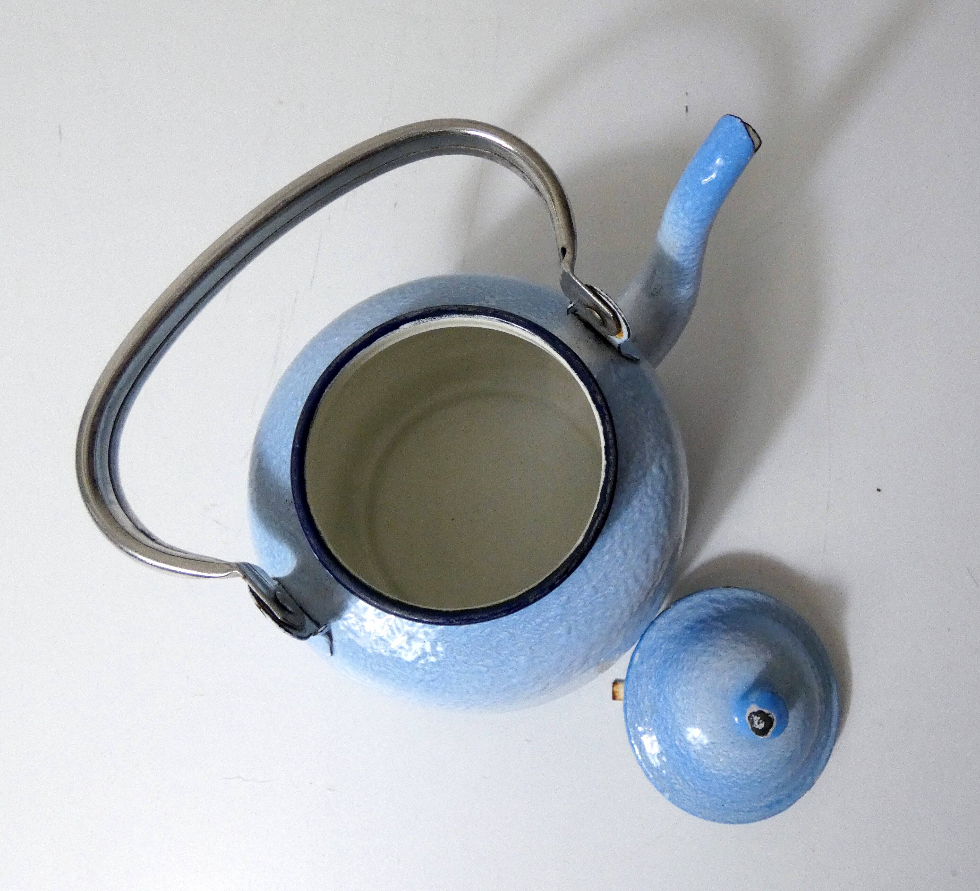 old enamelled steel kettle