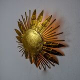 Brutalist sun floral wall lamp, gold leaf gilded metal, Italy, 1970