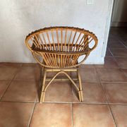 Rattan armchair with vintage design armrests