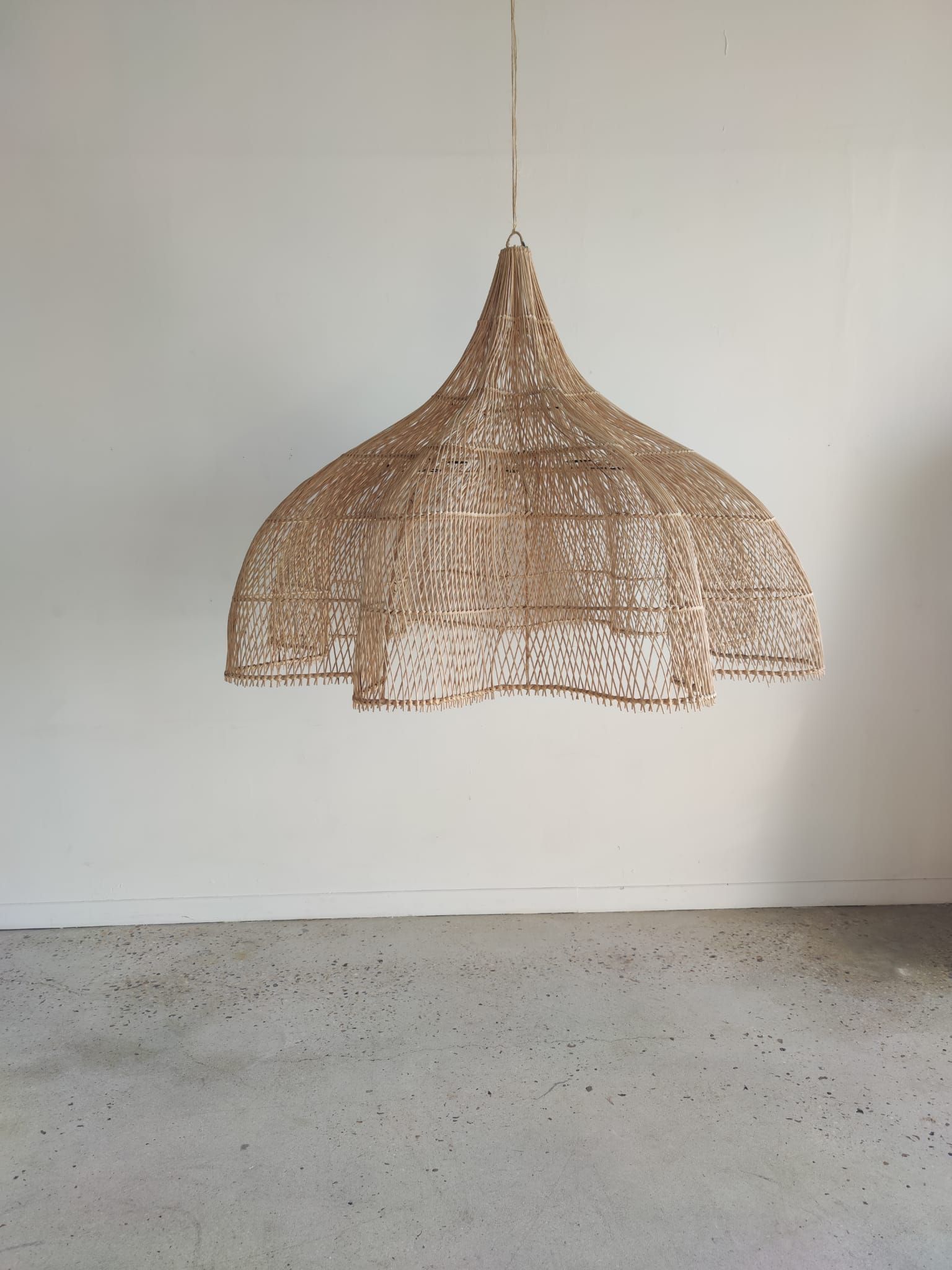 Huge rattan suspension in the shape of a corolla H:1m; D: 1m50