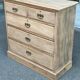 English stripped commode made of solid raw wood from the 19th century.