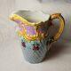 Art nouveau floral decorated barbotine pitcher