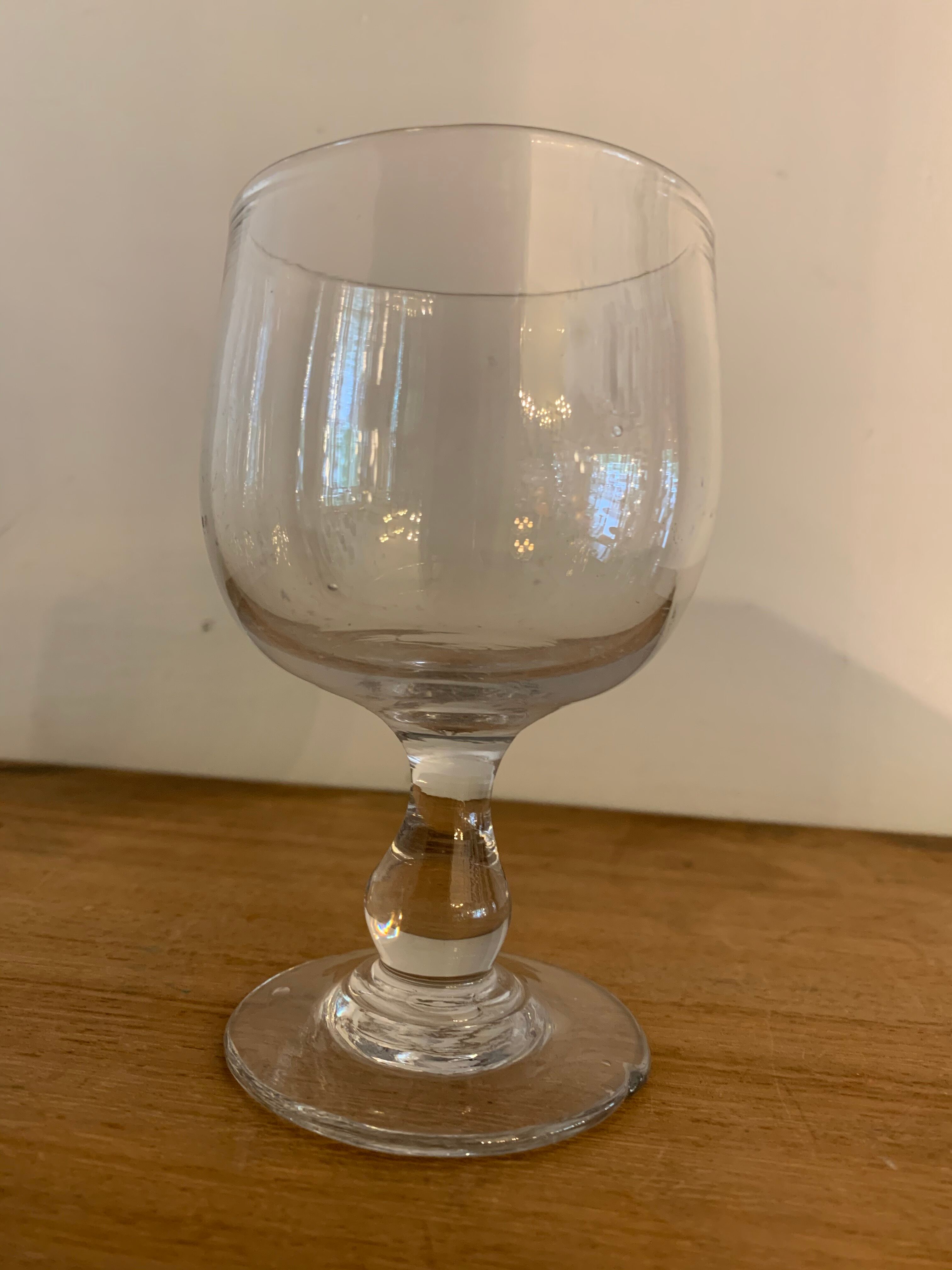 8 old red wine glasses with blown and bubbled glass walk