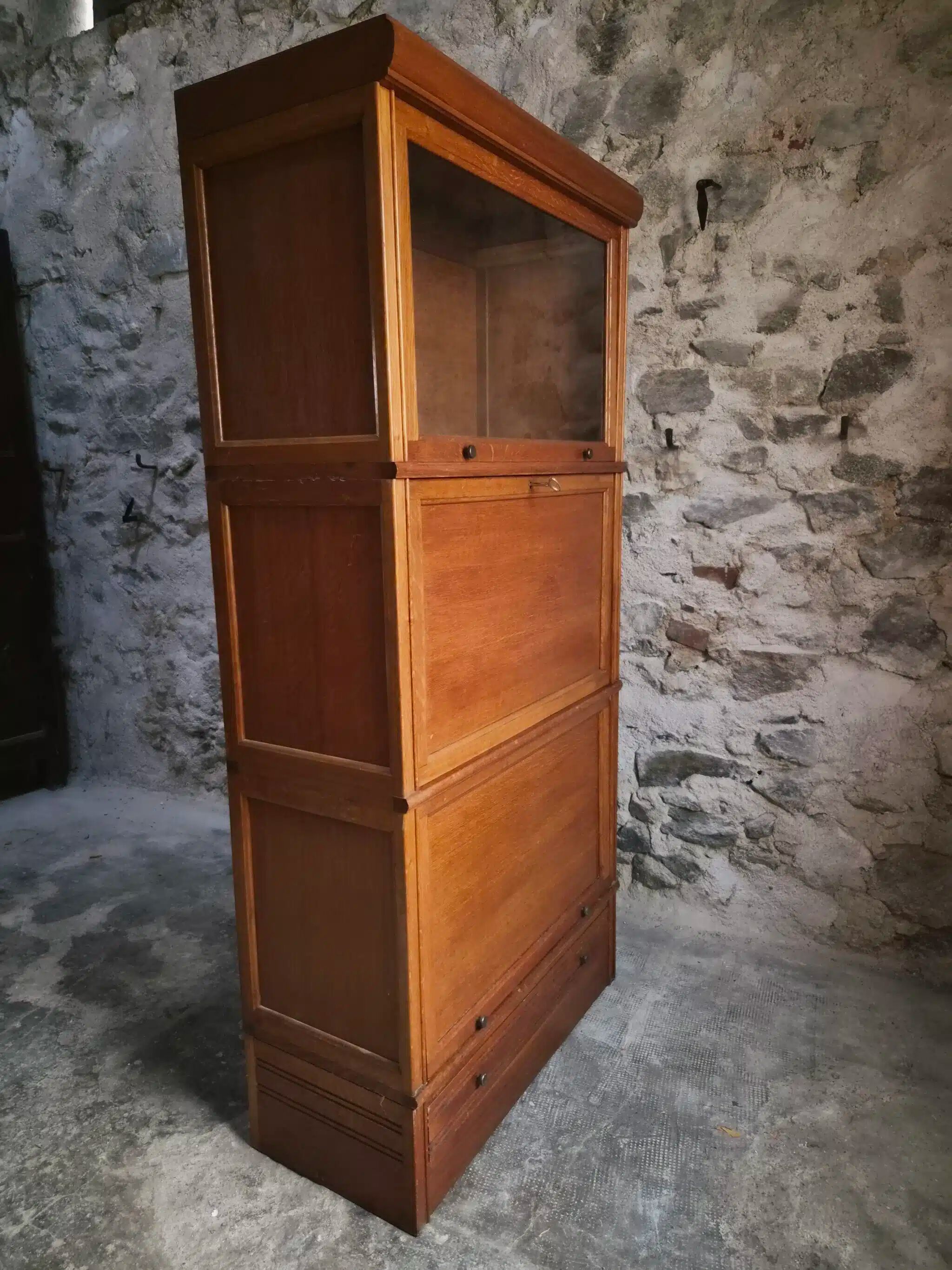 French modular secretary in oak with display case, 1950s.