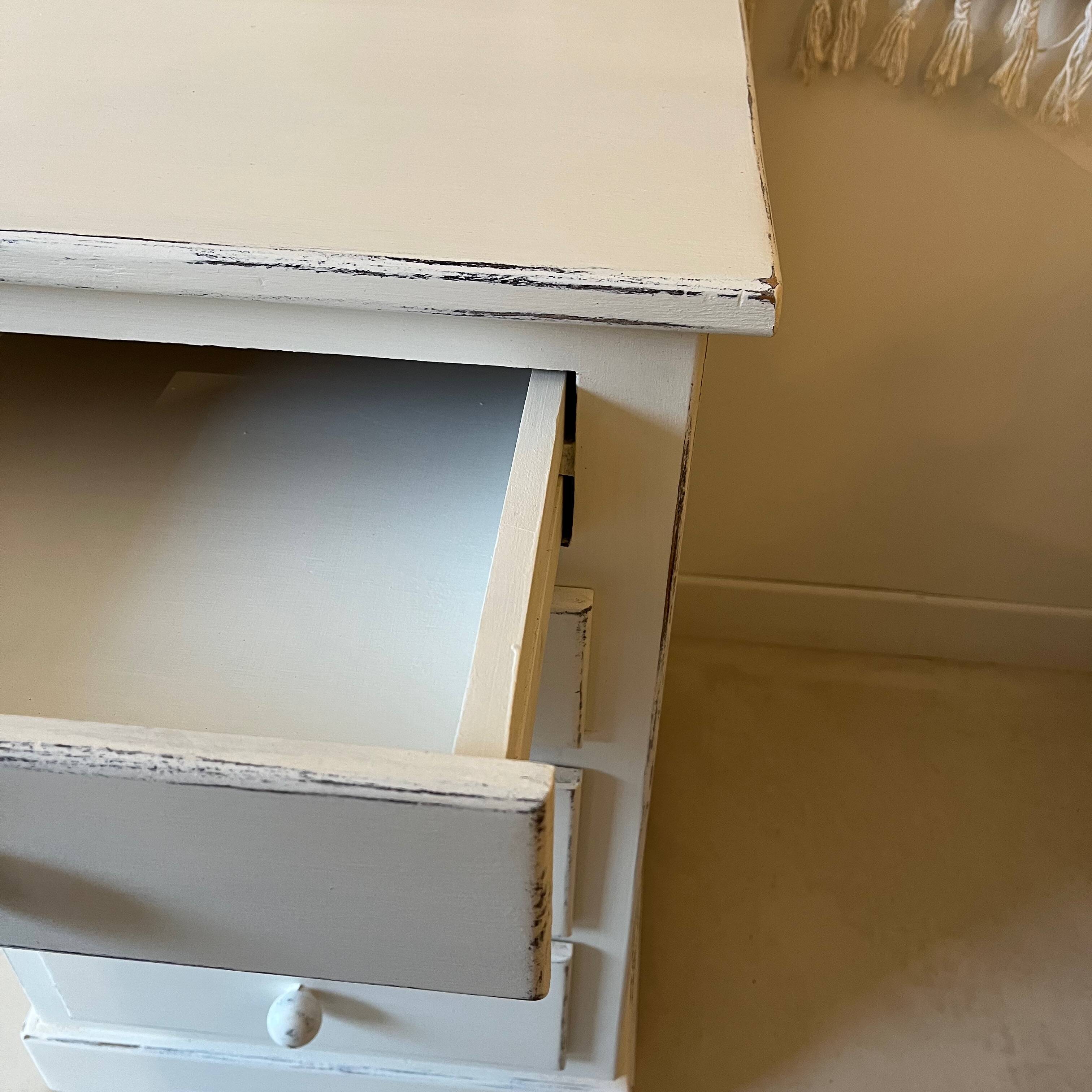 White patinated chest of drawers
