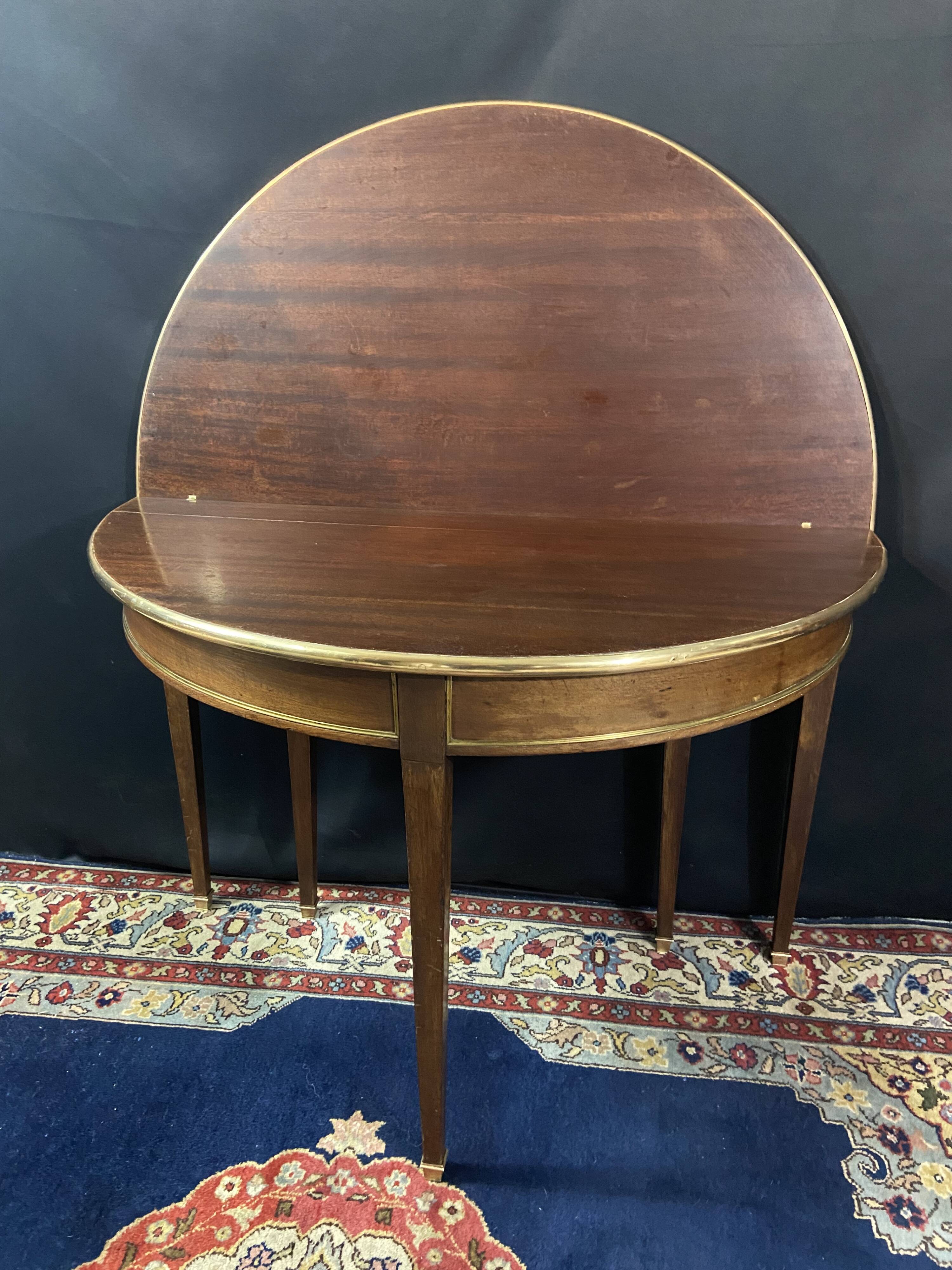 Console table demi-lune 19th century Louis XVI modular foldable top in mahogany.