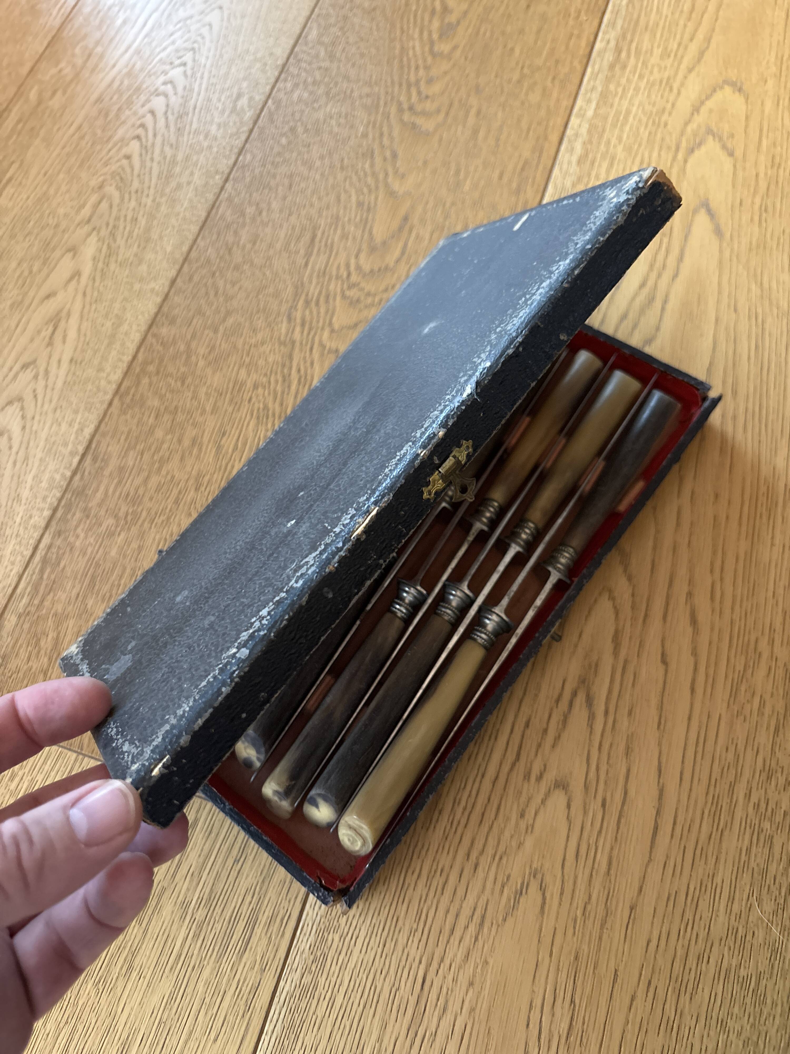 Knife with a forged steel bone handle