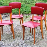 Set of 4 vintage chairs from the 50s in blond beech and red leatherette