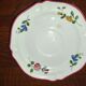 Assiette Vieux Saint Amand 1713 à bords chantournés à motif floral