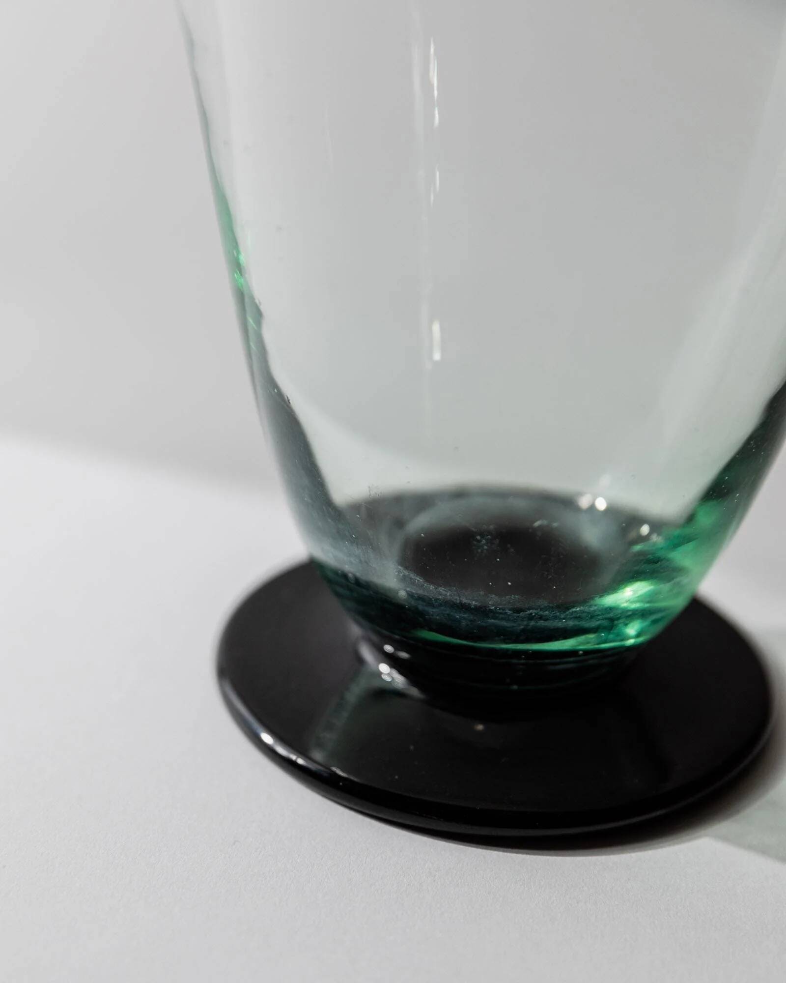 Vintage Murano glass carafe from the 1960s, green and black, with a stopper.