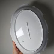 Antique deep dish in white Limoges porcelain, with rockwork relief.