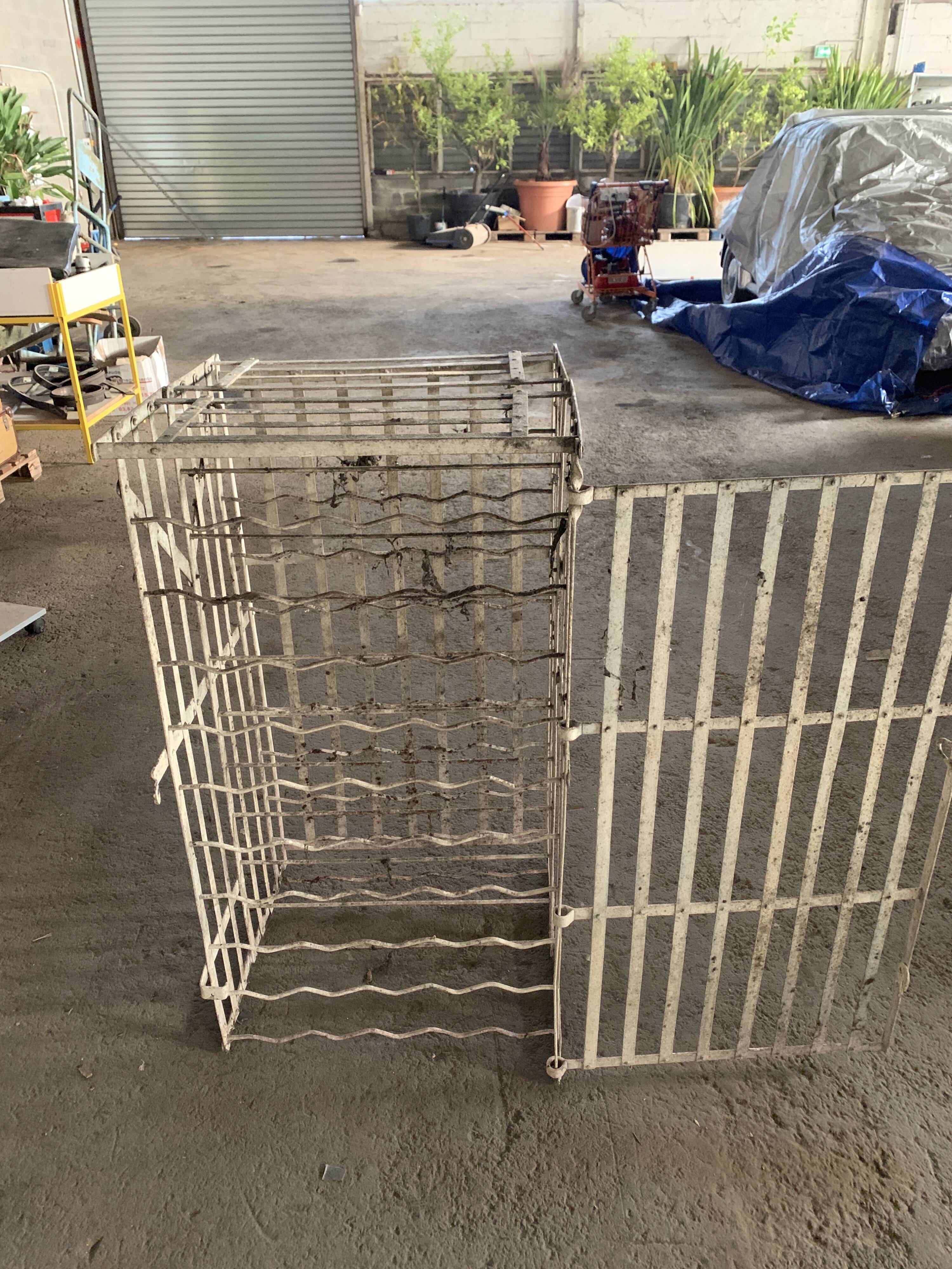 Old wine locker, metal bottle storage.