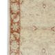 Tapis oriental en laine beige à motif floral