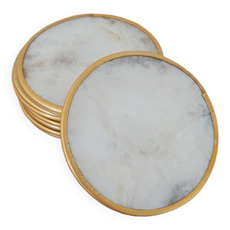 Lot de 11 dessous de verres en nacre cerclés de laiton.