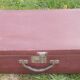 Vintage burgundy suitcase