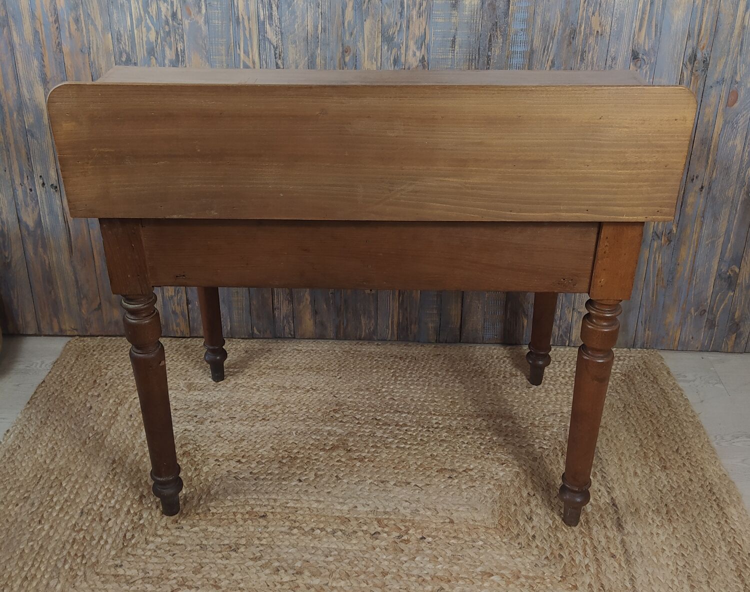 Wooden desk with turned feet